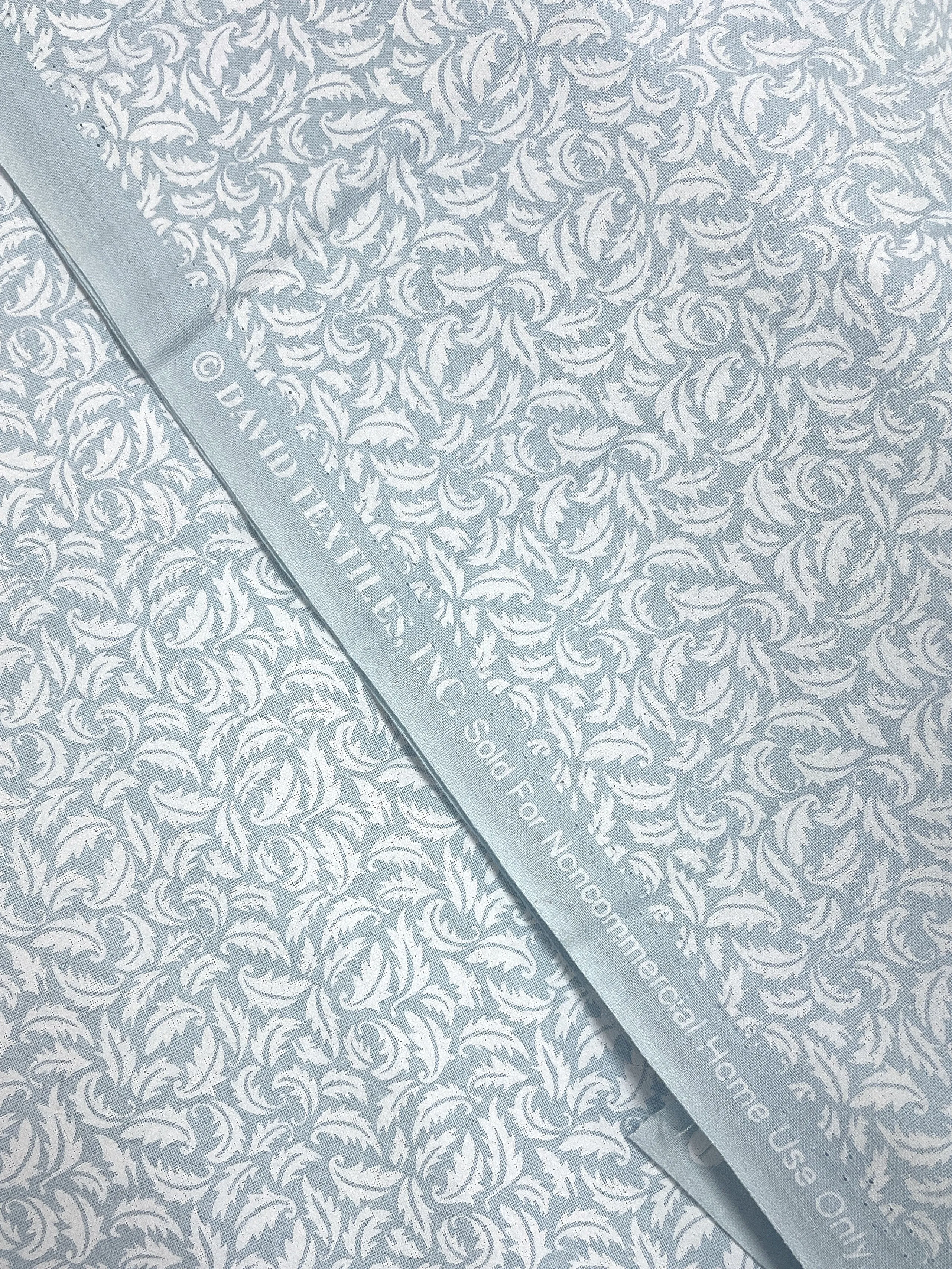 2 1/8 YD Quilting Cotton - Light Blue Printed with White Leaves